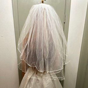 Bel Aire 31 inch champagne veil with trim around the veil and flower comb New